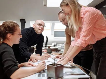 A nonprofit team working through their plan together